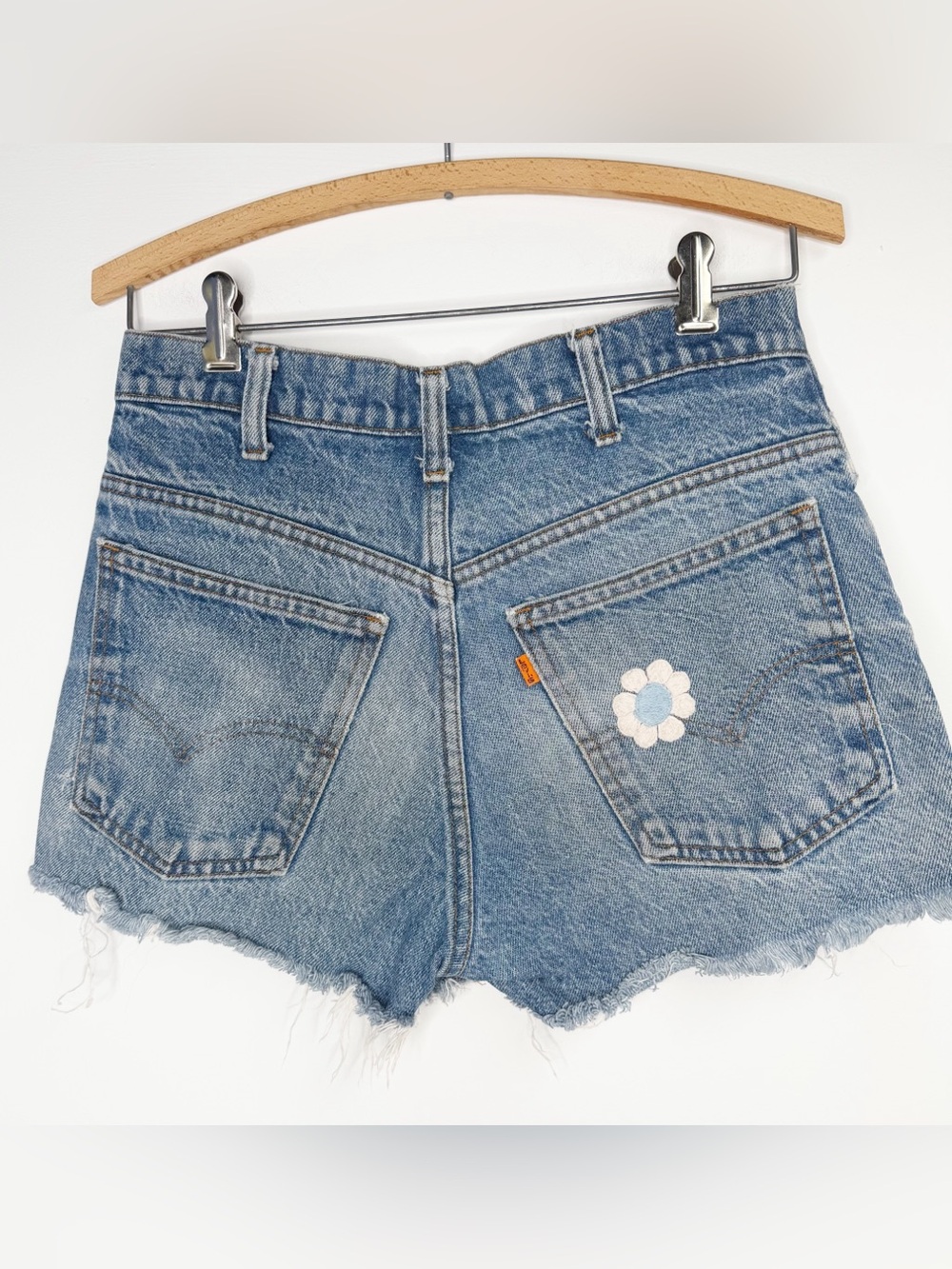 Vintage Distressed Levi’s Orange Tab Back Flower Embroidered Pocket Denim Shorts
